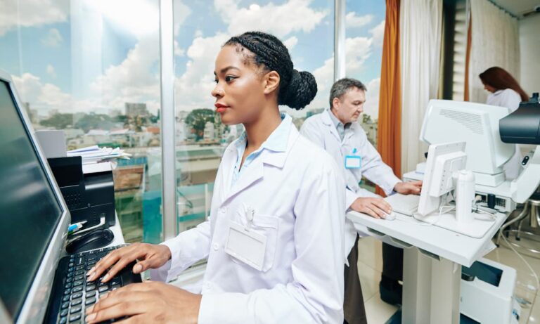 A hospital staff member using real-time analytics to provide better patient care.