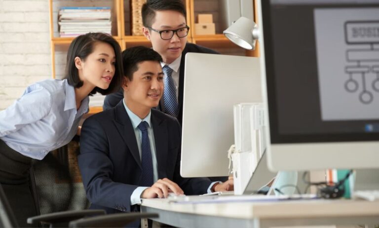 A business team uses a data-driven strategy to achieve work priorities.