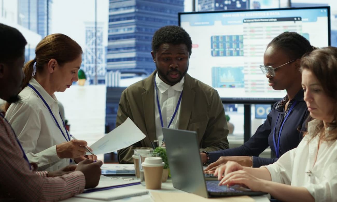 IT and business leaders discussing which technology projects to prioritize.