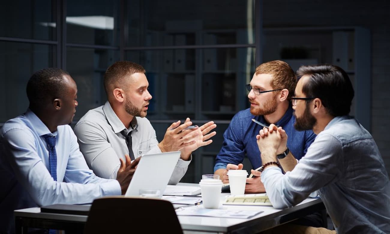IT Team having a discussion in the office